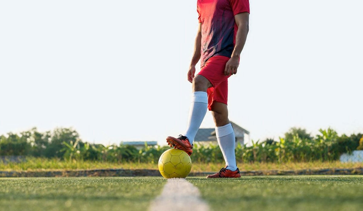 footballer-on-the-pitch-with-a-ball