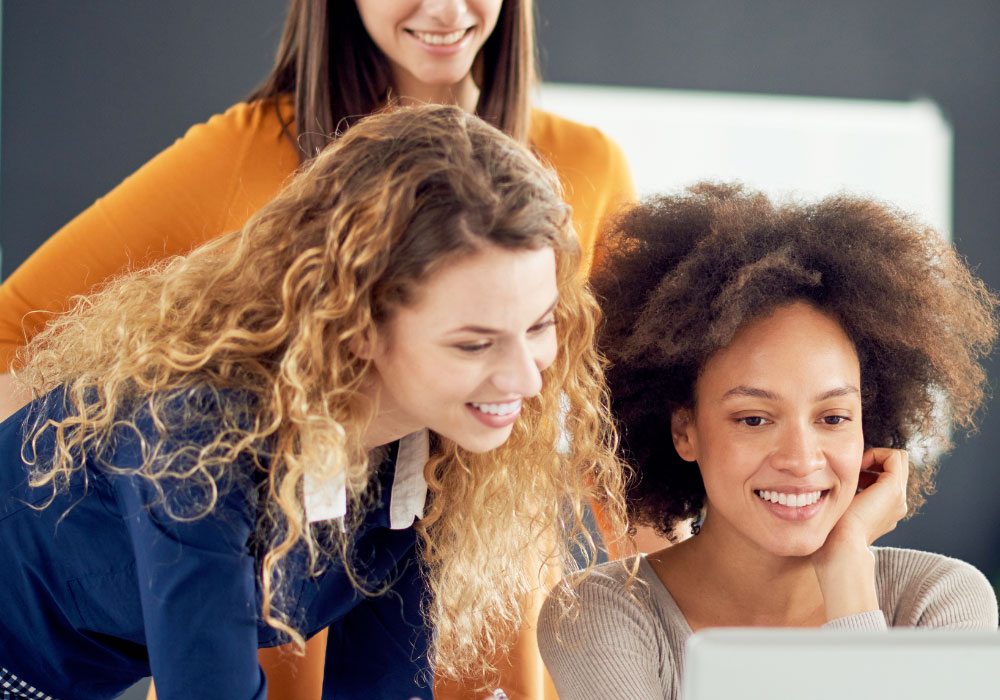 a small team of office workers in a good business environment