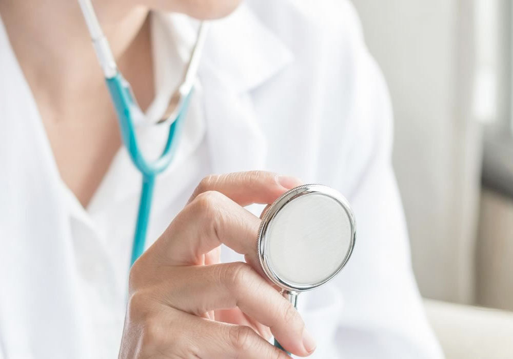 Occupational health professional performing an assessment