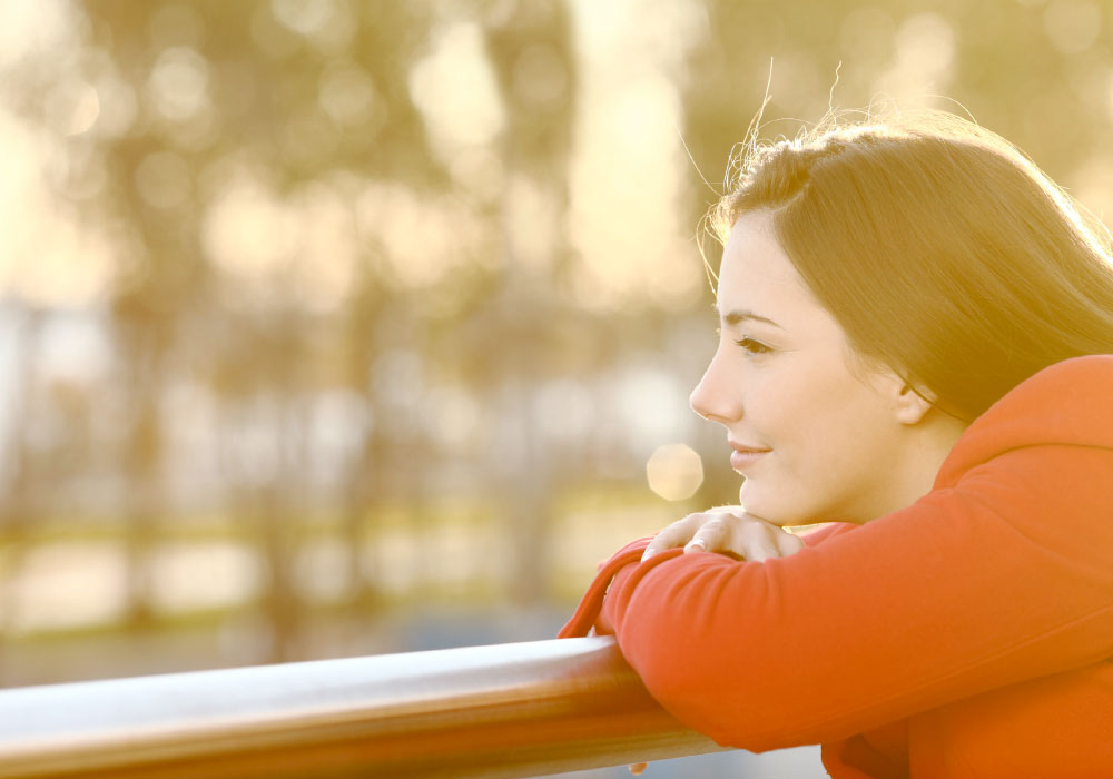 female employee taking time outside to destress